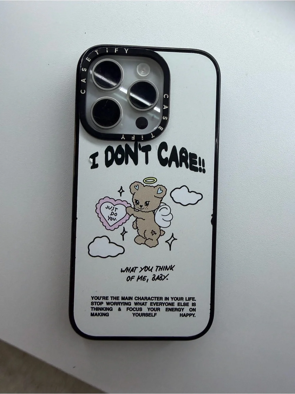 Casetify White Phone Case with 'I Don't Care' Bear Graphic and Pink Heart